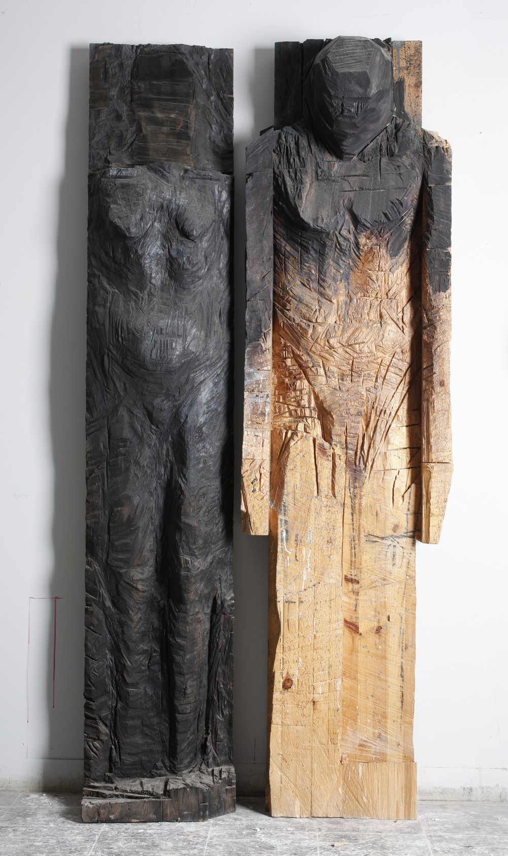 Wood sculpture "Couple."Photograph by Avi Chai