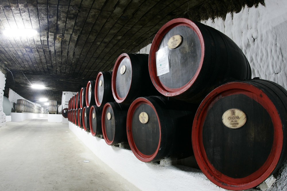 Endless rows of barrels line the walls of the winery's underground cellars. Photography: Cricova Winery, Moldova