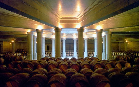 Château Lafite – The barrels are arranged in a perfect circle beneath the retractable domed roof. Photo and architecture: RBTA.