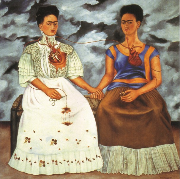 "The Two Fridas." A double self-portrait by Frida Kahlo, symbolizing the artist's emotional pain following her divorce (1939). Photography: Courtesy of Fridakahlo.com