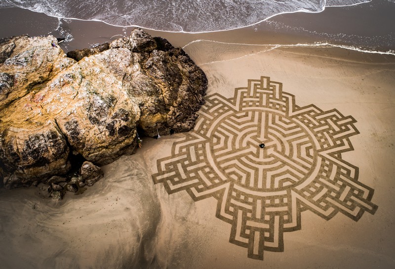 “Sun.” Geometric sand artwork by Andres Amador at Sutro Baths Beach, San Francisco.
