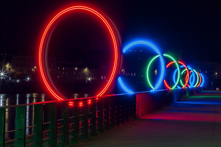 "The Rings" installation. Composed of 18 large illuminated rings, it was installed along the waterfront promenade in Nantes, France. Photos: Shutterstock.