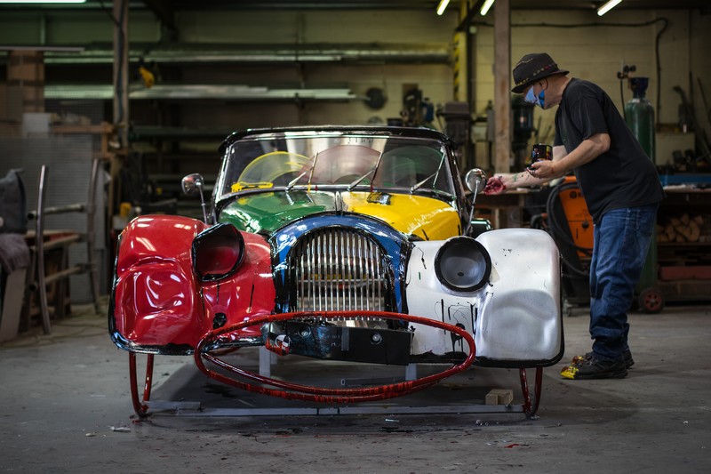 Arad at work, painting the car he built during the COVID-19 period from parts supplied by British automaker Morgan. Photo: Ron Arad And Associates Ltd